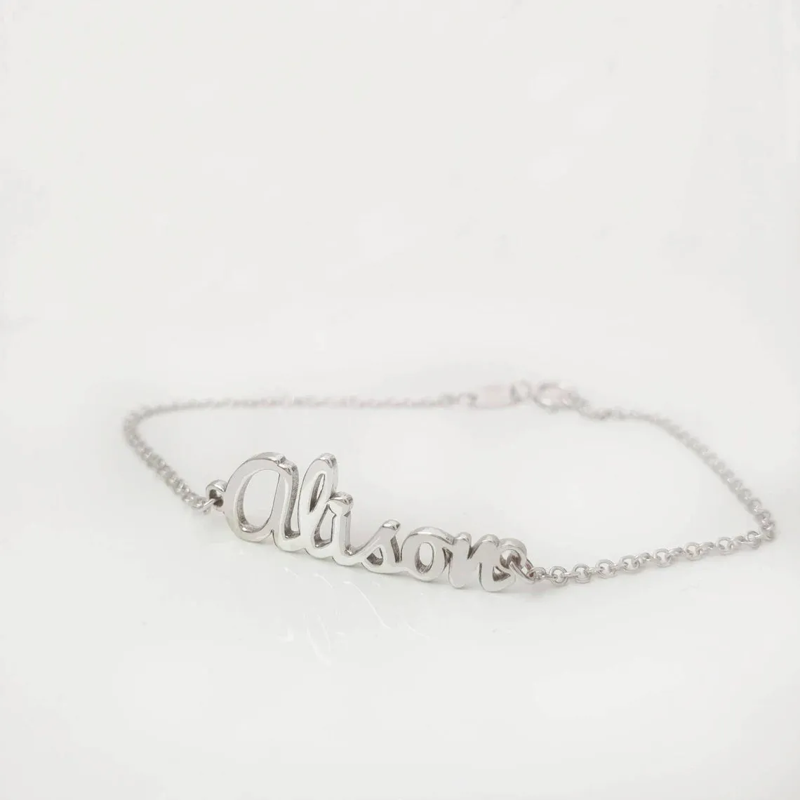 Custom name bracelet in solid gold