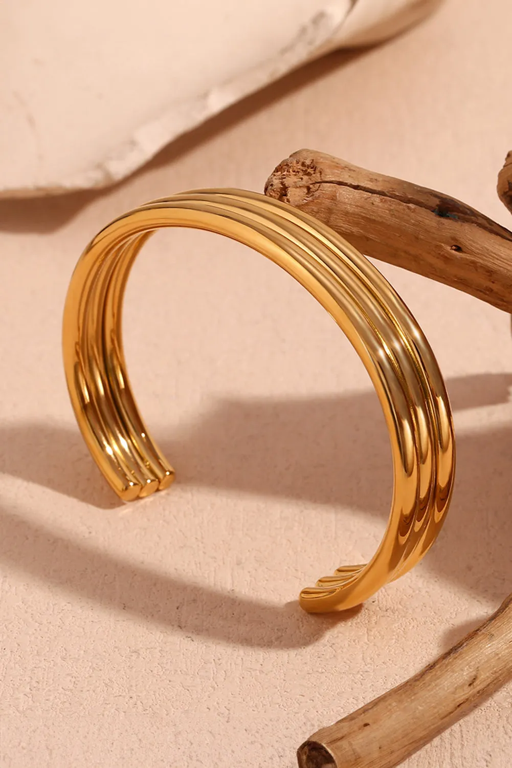 Gold Three Layered Notched Bangle