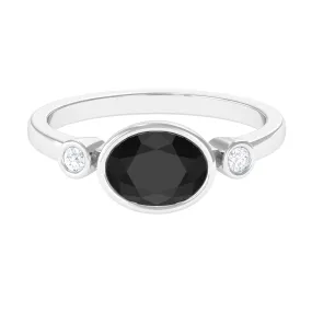 Oval Cut Solitaire Black Spinel East West Ring with Diamond